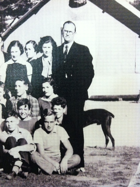 Our first principal, Arthur Main, with dog behind him